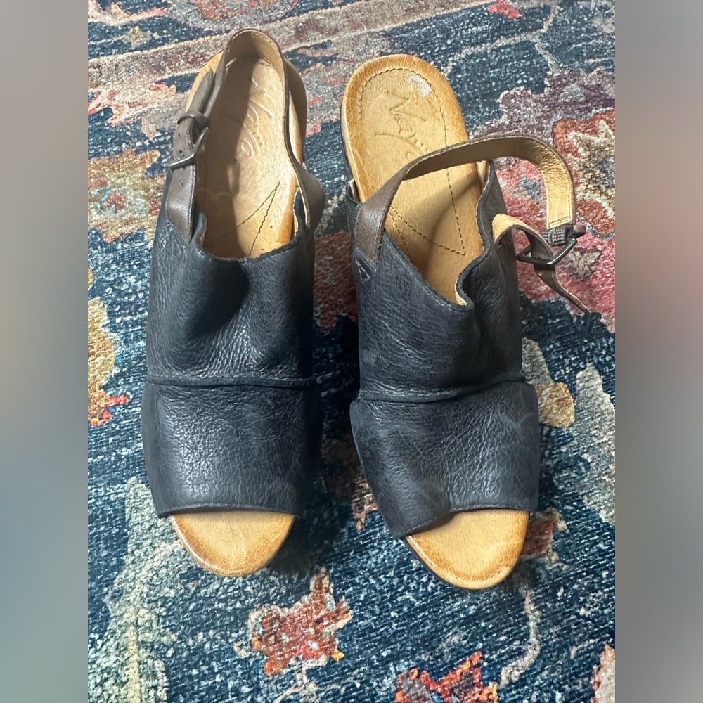 Naya black leather wedges